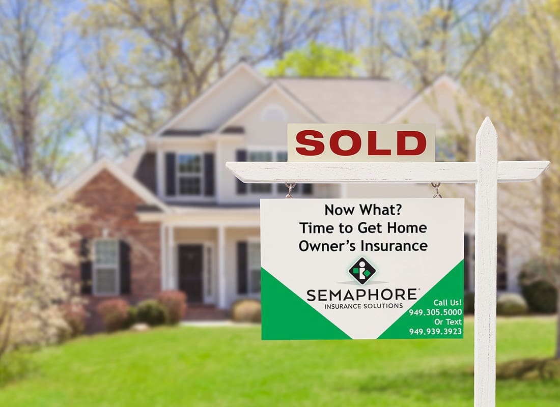 Insurance Solutions - Close-up of a Sold Sign for a Home